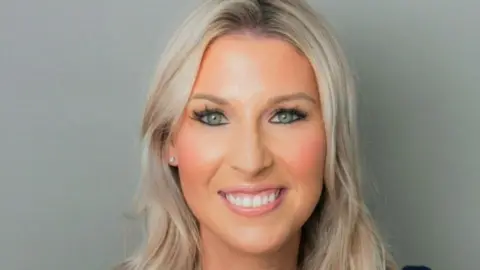 Emerald Law Solicitors This is a headshot of the managing director of Emerald Law Solicitors, Oonagh Murphy. She is smiling.