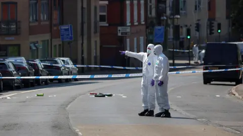 Reuters Nottingham attacks police cordon and forensic officers 