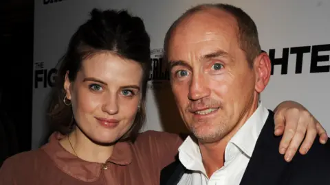 Getty Images Danika McGuigan and Barry McGuigan attend the private screening of 'The Fighter' at The Soho Hotel in January 2011.