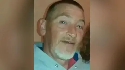 Family handout Pictured is Paul Sharp, a 52-year-old man, wearing a light-coloured top.