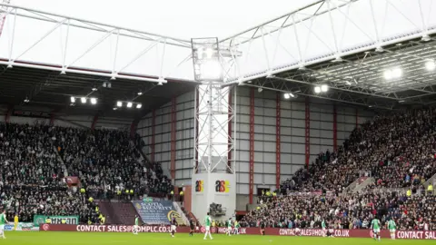 SNS A general view of the pitch and fans during a match between Hearts and Hibs at Tynecastle in December.