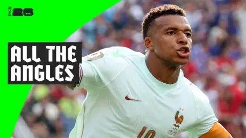 Kylian Mbappe runs with his arms spread apart to celebrate scoring the opener for France against Morocco in the 2026 World Cup.