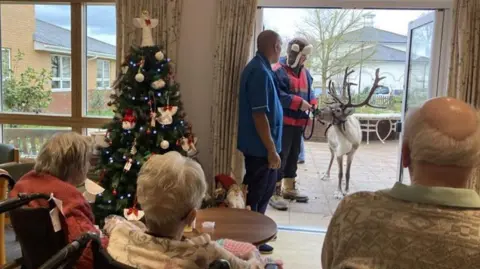Annabel Dry/BBC Reindeer visiting Rusthall Lodge care home, Tunbridge Wells