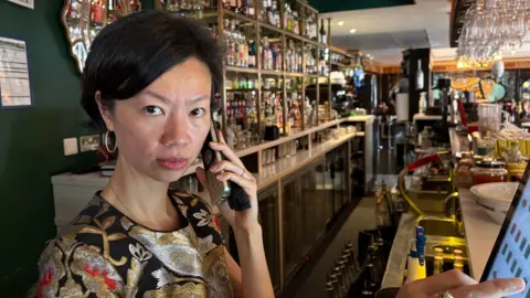 BBC Woman with phone