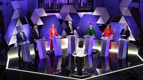 Representatives from seven of Great Britain's political parties take part in the BBC debate