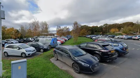 General view of rows of cars parked at Worcester Woods Car Park.