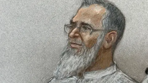  Julia Quenzler A courtroom sketch showuing Anjem Choudary at this trial.