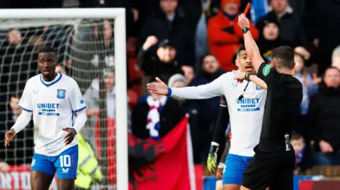 Nick Walsh sends off Mohamed Diomande during Rangers' win over Dundee United