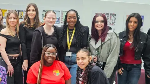 Shea and various students at One Sixth Form College in Ipswich