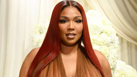 Getty Images Lizzo at the Christian Siriano fashion show as part of Spring/Summer 2026 New York Fashion Week held at Macy's Herald Square on September 12, 2025 in New York,