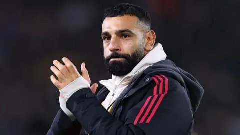 Mohamed Salah claps his hands