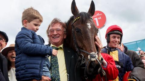 Fastorslow with winning owner and jockey