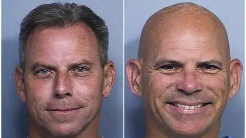 Mug shots of two men smiling, one with black greying hair and another bald man smiling