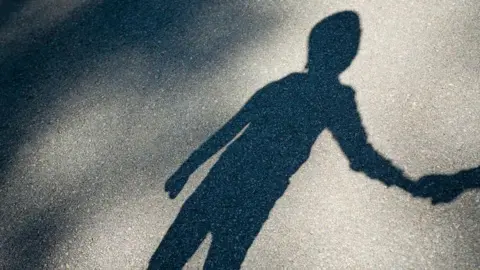 Getty Shadow of a child