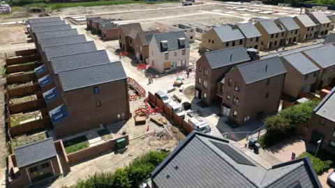 Steve Hubbard/BBC An aerial view of the housing development
