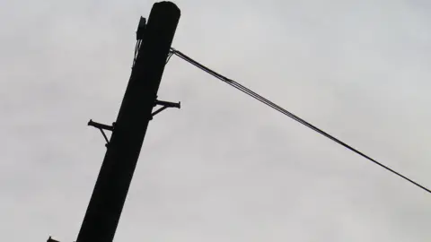 BBC A single telegraph pole with a cable attached to the top