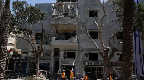 The site of a missile strike in Haifa