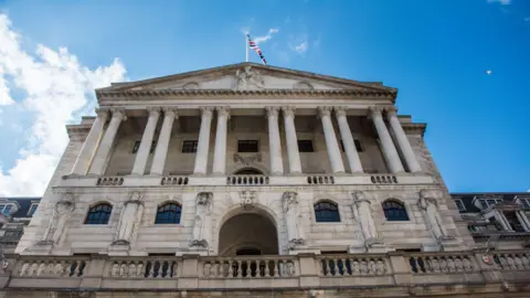 Looking up from ground level at he exterior of the Bank of England