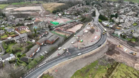 National Highways Drone photograph of Roe Cross Road in Mottram, The image show the raod has been diverted before an underpass is built.