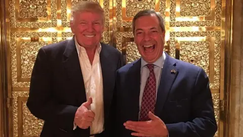 @Nigel_Farage Donald Trump and Nigel Farage stand next to each other