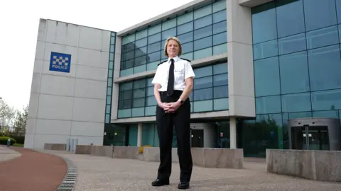 BBC Northumbria Police's Chief Constable Vanessa Jardine wearing her uniform and standing in front of Northumbria Police's headquarters.