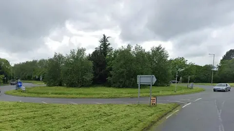 Google Beehive roundabout in Bolton on a cloudy day.