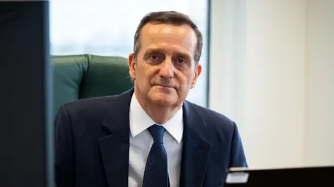 PA Media Director of Public Prosecutions Stephen Parkinson, pictured sitting behind a desk in his office
