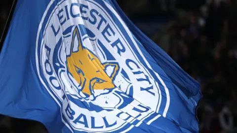 A flag with the Leicester City logo on it