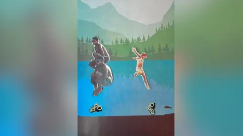 A cut-out diorama of children jumping into a lake. There are amoebae underneath them.