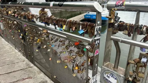 Dozens of padlocks on Pero's Bridge before they were removed