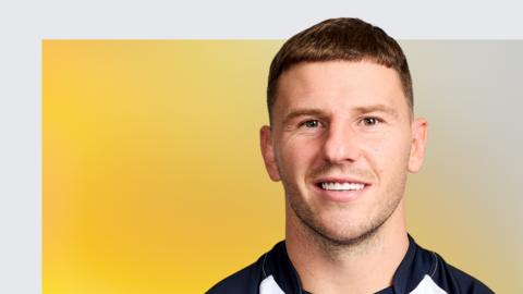 George Williams poses for his promotion photo while in the England camp