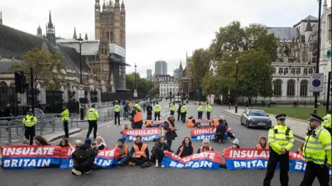 Getty Images insulate Britain protesters sat on the road