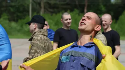 A jubilant Ukrainian soldier