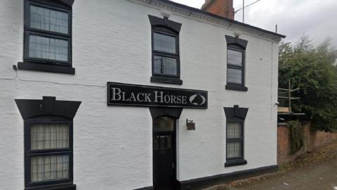 The front of the Black Horse pub in Cold Ashby