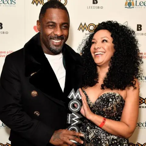 Getty Images King posing in the winners room with Idris Elba, the recipient of the Mobo paving the way award in 2017