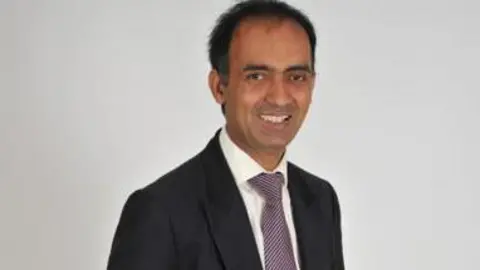 LDRS Mohammed Farooq looking happy after being elected to the city council 