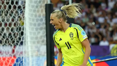 Sweden's Stina Blackstenius celebrates scoring their second goal 