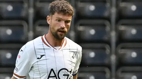 Cameron Burgess in action in Swansea's pre-season friendly against Leganes 