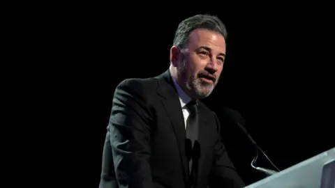 Getty Images Jimmy Kimmel performs onstage as Keep Memory Alive hosts star-studded lineup at annual "Power Of Love" gala at MGM Grand Garden Arena on February 22, 2025 in Las Vegas, Nevada