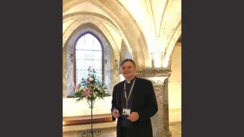 Rochester Cathedral The Very Reverend Philip Hasketh standing inside Rochester Cathedral.