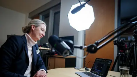 Alice Weidel, co-leader of Germany’s far-right party AfD (Alternative fuer Deutschland) is pictured in her office before a virtual talk event with U.S. billionaire Elon Musk on his platform X in Berlin, Germany, January 9, 2025