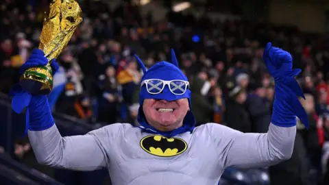 Scotland fan dressed as batman