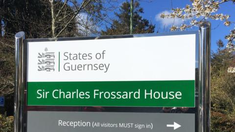 A sign for the States' offices at Charles Frossard House.