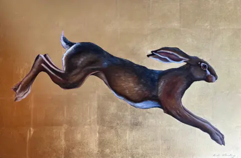 Art for Cure Painting for a hare leaping forwards against a gold background