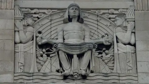Geograph/Stephen Richards An ornate carving above Sheffield Central Library shows an Egyptian figure called Knowledge holding an ankh in one hand and an asp in the other, representing the choice between good and evil.