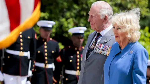 King Charles III and Queen Camilla visit the Tomb of the Unknown Soldier during a ceremony at Arlington National Cemetery on the final day of the state visit of King Charles III and Queen Camilla on April 30, 2026 in Arlington, Virginia.