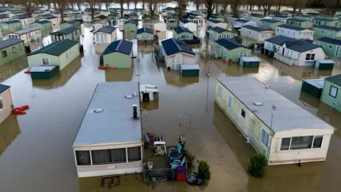 PA Media Caravans flooded at Billing Aquadrome.