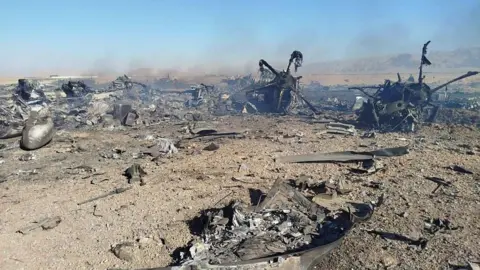 Getty Images  Wreckage is seen from what Iranian authorities say is a US military helicopter that crashed during a mission to rescue the missing American pilot of an F-15E that was downed earlier this week, in a handout image provided on April 5, 2026 in an unspecified location in Iran.