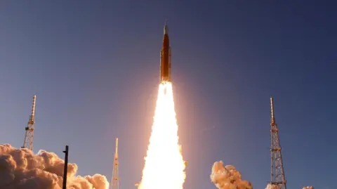 Artemis II rocket blasting off