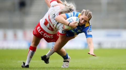 Action from St Helens against Leeds Rhinos in the Women's Super League